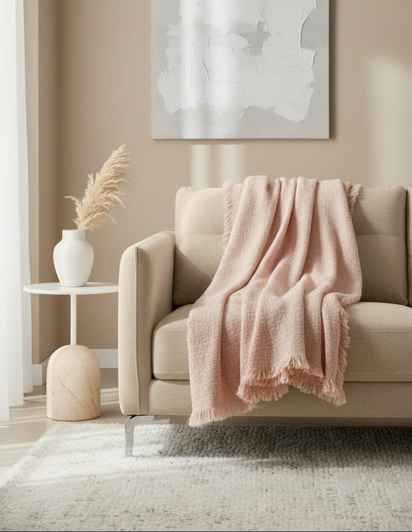 Plaid en lin rose poudré.