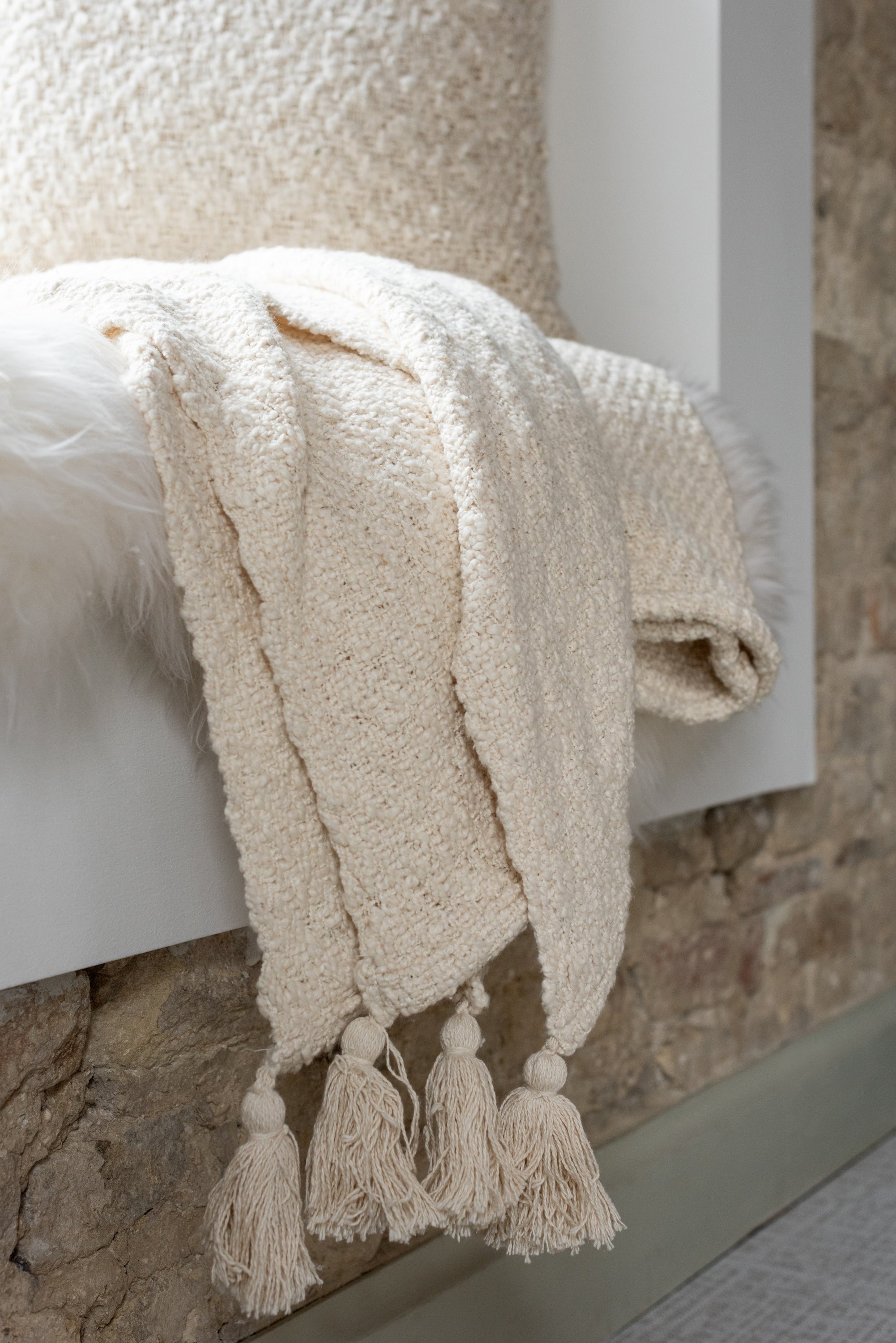 Plaid beige au style minimaliste.